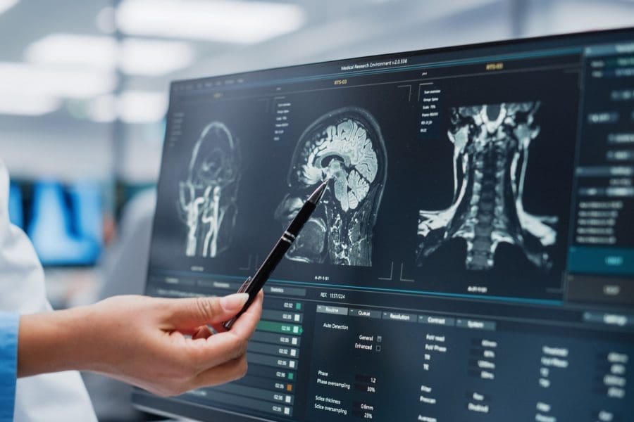 A doctor looking at the results of an MRI scan.