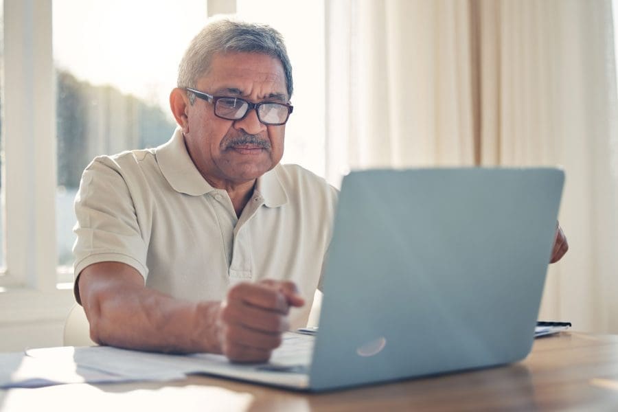 A man using a laptop.