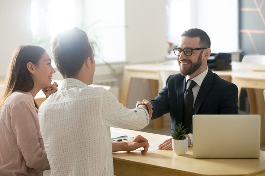 A couple meeting with a financial planner.